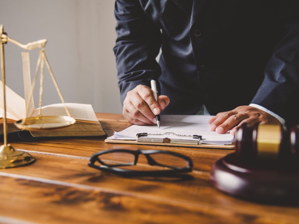 judge signing papers representing motion for default judgment